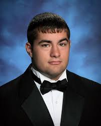 Doddridge County High School graduates cross stage May 21