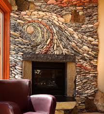 The Ancient Art Of Stone Couple Creates Beautiful Rock Wall Art Installations Stone Wall Art Stunning Interior Design Fireplace