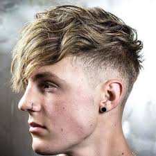 Who recommends barbers for low taper fades?