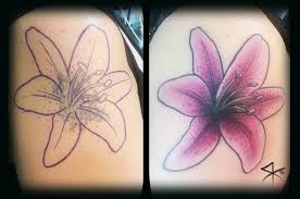 Most often, the men resorted to a small tattoo on their body. Cool Lily Flower Cover Up Tattoo Design For Shoulder