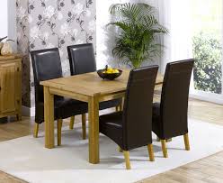 This stunning oak finish dining table would make a great addition to your home. Cipriano Extending Oak Dining Table And 4 Leather Chairs Furniture In Fashion
