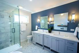 The countertops pop off white wainscoting while still staying in sync with other bathroom surfaces. Bathroom Countertops The Pros And Cons Of Engineered Quartz