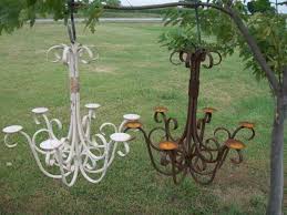 Candle chandeliers are used as an integral part of the room's decor and are suitable for a multitude of different themes and styles of the rooms. 30 Wrought Iron Old English Real Candle Chandelier Garden