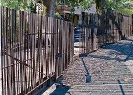Anchored in concrete it is quite the t post is designed for the application so it uses its weight in the optimal way for post duties. Rebar Fence Backyard Fences Fence Landscaping Natural Fence