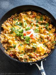 One Pan Mexican Chicken And Rice An Easy Dinner Ready In Under 30 Minutes The Girl Who Ate Everythin Mexican Dinner Mexican Chicken And Rice Mexican Chicken