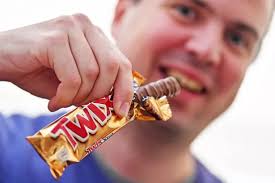 Twix-addict who spends equivalent of a round-trip to New York a year