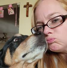 Who are some recommended female tattoo artists in the Lansing area?