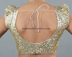 A statement golden sequin blouse is such a fab idea with a muted saree or lehenga! Gold Sequin Blouse South India Fashion