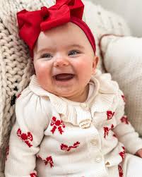 G O L D I E is ✋🏻months old! She LOVES attention, being held and talked  to, baths, eating her hands, her brothers (especially when they are being  wild), daddy singing to