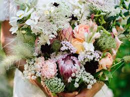 Flynn recommends tying one end of the twine to the bottom of the stem, leaving a long tail to fasten to the drying rack or hanger. Everything You Need To Know About The Bridal Bouquet