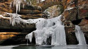 Hiding in one of the most scenic regions of ohio, the cliffs at hocking hills is a luxury cabin getaway that features a heated waterfall swimming hole, secret passageways, sweeping views, a massive hot tub and so much more. Hocking Hills State Park Transforms Into Winter Oasis