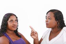 Authoritarian parenting is one of three major parenting styles, but research shows it can negatively impact both parent and child. Mother Warn Her Daughter For Bad Behavior Isolated On White Stock Photo Picture And Royalty Free Image Image 13418054
