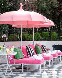 Black And White Striped Outdoor Umbrella With Lights Tobi Fairley Interior Design On Instagram Outdoor Pool Area With Pink Cushions Pink Umbrellas Gray And White In 2020 Canopy Outdoor Patio Outdoor Patio Umbrellas