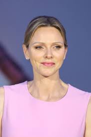 Pretty in pink! Princess Charlene of Monaco joins an emotional Prince  Albert to mark the monarch's 20th year