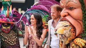 Meghan makes blunt one word order to an 'awkward' Harry, uses 'tow-along  hand clasp' tactic while couple's quasi-royal tour of Colombia kicks off,  experts claim