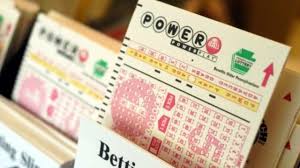 Five white balls are drawn from a set of balls numbered 1 through 70; Luckiest Lottery Numbers Powerball Mega Millions Most Common Picks