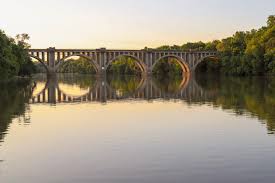 View From City Dock In Fredericksburg Virginia Of Railroad