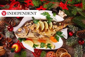 It's polish christmas custom to leave one free table setting for an unexpected guest. Polish Christmas Dinner Carp In The Bathtub And Hay Under The Tablecloth Jay Mccarthy