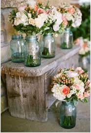 22 Creative Decorative Uses For Mason Jars Rustic Wedding Bouquet Wedding Centerpieces Wedding Flowers