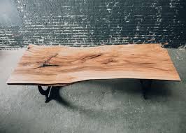 Located in west palm beach, fl. Live Edge Solid Wood Beech Slab Table With Modern Bronze Cast Iron Base At 1stdibs
