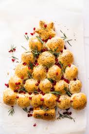 It is a simple and funny recipe that you add some herbs, like some fennel leaves, to decorate the board. Cheesy Christmas Tree Pull Apart Bread Simply Delicious