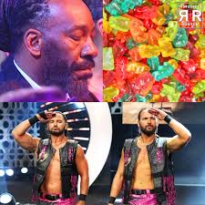 Men wearing AEW belt in shoulder holster style