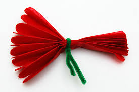 Spritzing these paper flowers with a bit of paint makes for a splattered look that mimics the random, unique color patterns on true blooms. Tissue Paper Pom Pom Flowers Kids Crafts Fun Craft Ideas Firstpalette Com