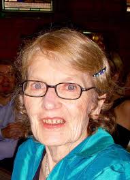 Can someone edit the photo to make her face brighter?