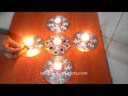 You can also hang this on wall or can be made on floor. Innovative Cd Rangol With Semolina Honey Kundan Diwali Diya Decoration Ideas Easy Cd Crafts