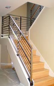 Selecting the right stair railing or hand rail for your space is a major design decision that can impact the feel of your home. 7 Stainless Steel Stair Railing Ideas Steel Stairs Stair Railing Steel Stair Railing