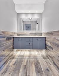 Artistic Tile I Our Wood Look Kauri Plank In Tasman Blue Adds Refinement And Warmth To This Upper East Side Ny House Flooring Home Refinishing Hardwood Floors