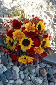 These exquisite roses in red, beautifully represent the. Red Rose And Sunflower Wedding Bouquet Oosile