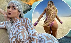 Demi Rose goes NAKED beneath just white body paint before slipping into  bejewelled thong bodysuit in latest slew of racy snaps 