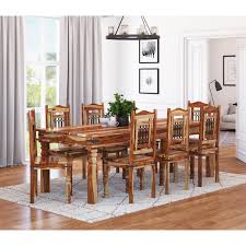 Rustic dining room set in the middle of a room in a modern style becomes a focal point that steals attention. Dallas Classic Solid Wood Rustic Dining Room Table And Chair Set