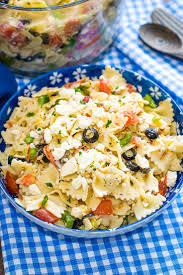 Black And White Bow Tie Pasta Artichoke And Feta Pasta Salad Is Going To Be Your New Favorite Bow Tie Pasta Loaded With Artichoke Hearts Feta In 2020 Potluck Dishes Pasta Salad Greek Salad Pasta