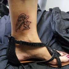 As the tattoo is quite big in structure, and the wings lay flapped on both sides, it adds a gorgeous look to the individual's body. 44 Beautiful Guardian Angel Tattoo Designs To Get Inked