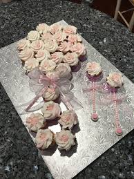 They're so clever and fun, nobody has to know how easy they are to make. Baby Rattle Pull Apart Cupcake Cake Baby Rattle Cupcakes Baby Shower Cupcakes For Girls Pull Apart Cupcake Cake