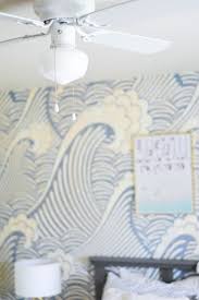 Then, fasten the blade irons to the motor with the screws provided. How Installing A Ceiling Fan Changed Our Bedroom