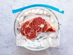 It can be helpful to use a heavy plate or pot to keep it submerged and surrounded by water. How To Thaw Meat Fast