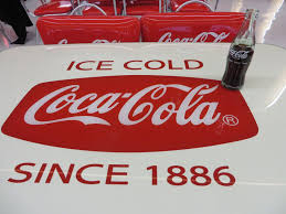 The bottom half is a white background with the red coca cola bottle in the center and the red caption open happiness underneath the. Open Happiness A Visit To Japan S East Coca Cola Factory Higashikurume Japan B