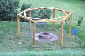Adding outdoor furniture is great when you have a roof to protect cushions. Dad Diyer Builds Genius Backyard Porch Swing Fire Pit