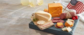 American cheese—the kind you get in the individual plastic wrappers—is processed cheese or though american cheese describes that familiar sandwich staple, it does not encompass. Original American Cheeses