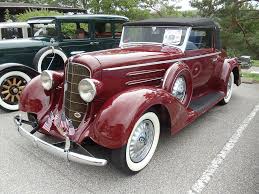 Image result for Garnet Maroon 1931 Oldsmobile