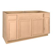 Such cabinets' dimensions allow fitting standard sizes of cabinets for range and a cook top will depend on actual appliances dimensions, but most of them fit in 30, 33 or 36 inches cabinets. Project Source 60 In W X 35 In H X 23 75 In D Natural Unfinished Oak Sink Base Fully Assembled Cabinet In The Stock Kitchen Cabinets Department At Lowes Com