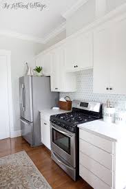 the lettered cottage kitchen cabinets