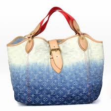 When authenticating a louis vuitton piece, matching the factory code letters with the country listed on the 'made in' stamp is a good first step towards verifying a bag. Louis Vuitton Denim Sunbeam Tote Bag Duet Curated Consignment Louis Vuitton Bags Vuitton