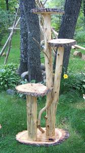Plant Stand Image Cedar Log Plant Stands Outdoor Plant Stand Log Home Plant Stands Homemade Mit Bildern Palettenmobel Im Freien Gartenskulpturen Diy Blumenstander