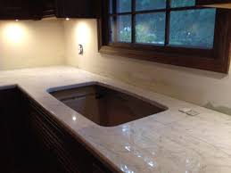 This sink isn't made of solid porcelain—it's constructed from cast iron with a porcelain enamel finish. Kitchen Sink Is White Really White