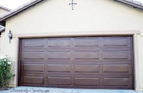 Based in cambride on the border of hertfordshire. Diy Garage Door Makeover With Stain Domestically Speaking