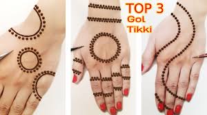 As the fashion trends are extending you can either select one type or use combination of two over the front and back of the hands. Top 3 Gol Tikki Mehndi Designs For Back Hand Beautiful Mehandi Design For Hands Mehdi Ka Design